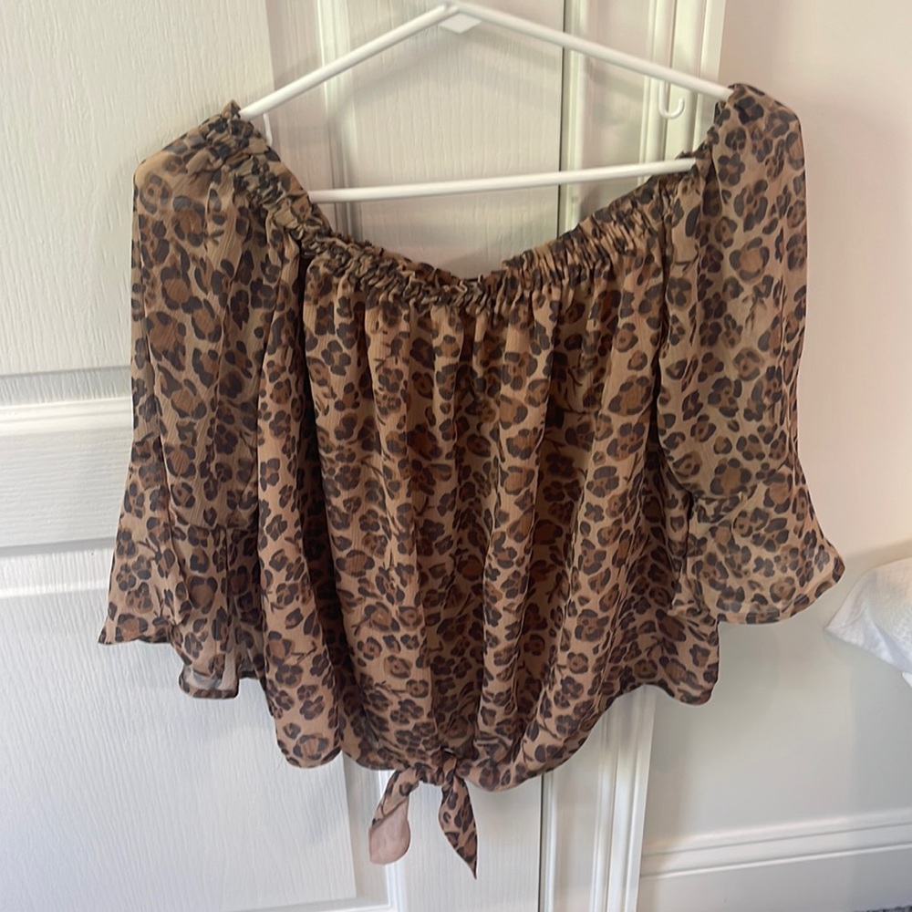 Express size medium cheetah blouse with flowy sleeves and tie at bottom scrunch